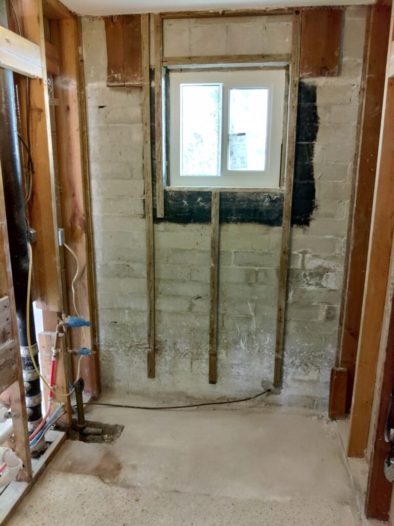 Old bathroom removal job site prep for remodeling service completed