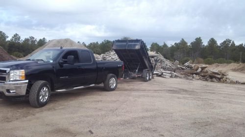ABV Debris Removal LLC from Ormond Beach Fl truck and trailer dumping concrete and junk